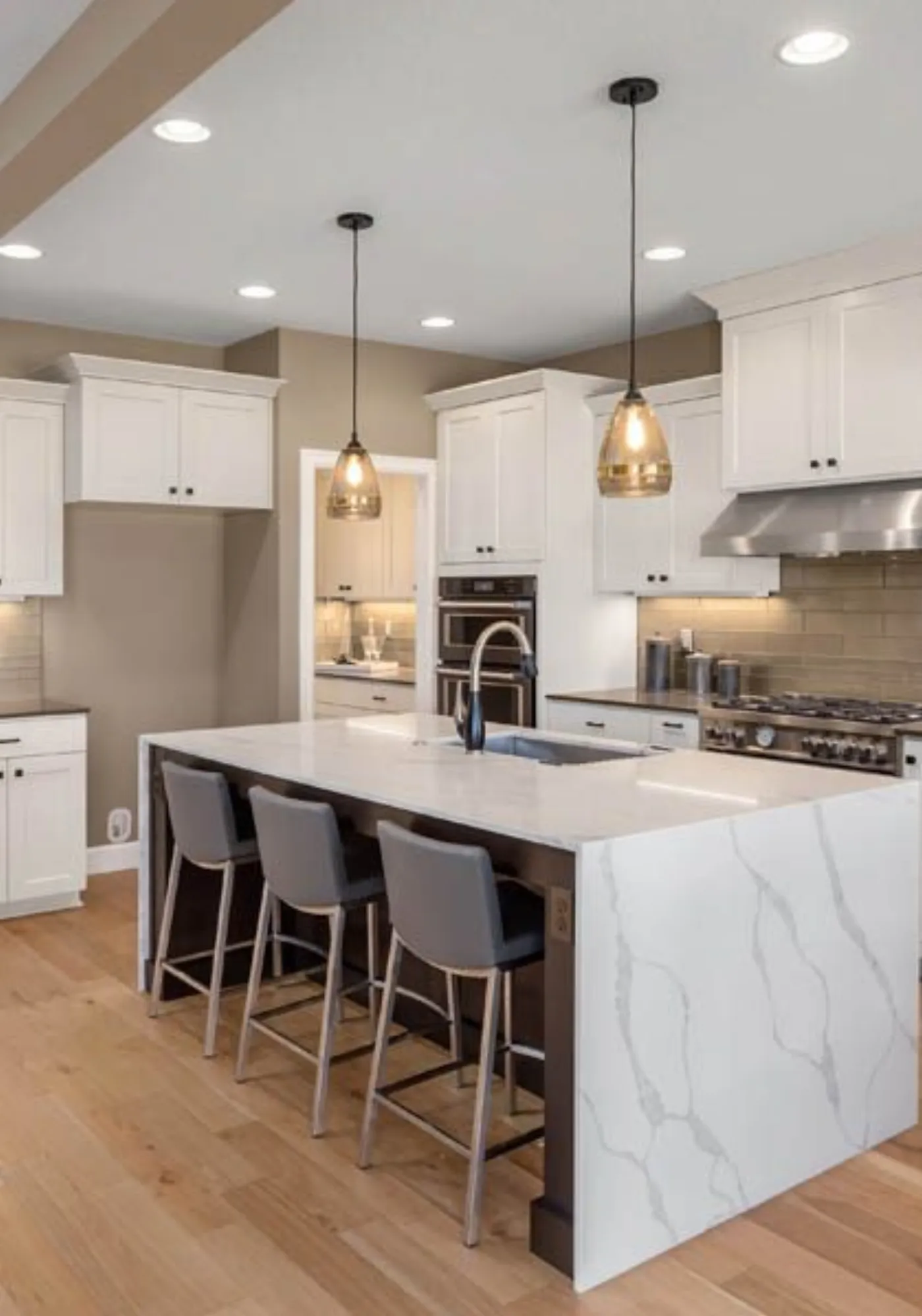 Designer reviewing finish samples and a kitchen layout