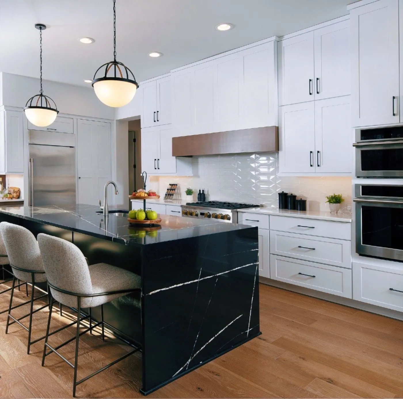 Custom remodeled kitchen with island and full-height cabinetry