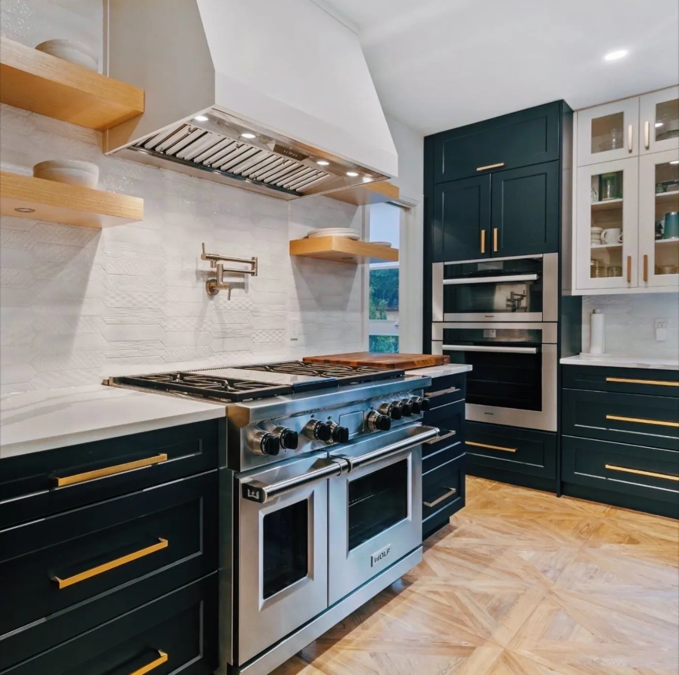 Designer-planned custom kitchen with island, full-height cabinetry, and quartz countertops